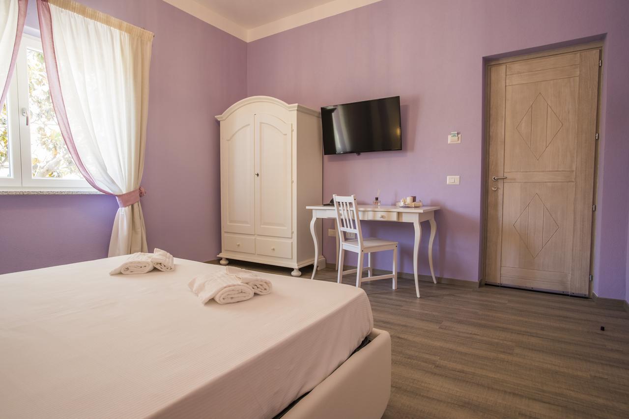 Les Suites Magnolia Olbia Bagian luar foto