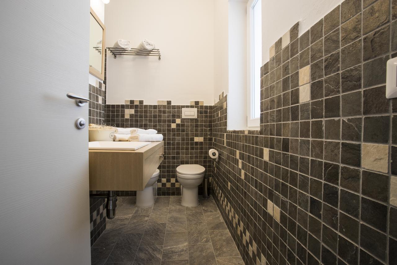 Les Suites Magnolia Olbia Bagian luar foto
