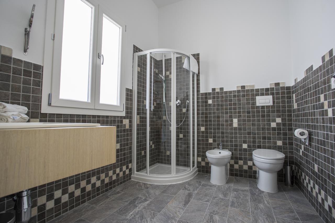 Les Suites Magnolia Olbia Bagian luar foto