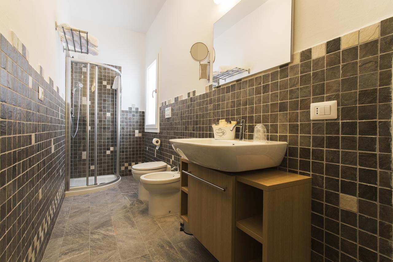 Les Suites Magnolia Olbia Bagian luar foto