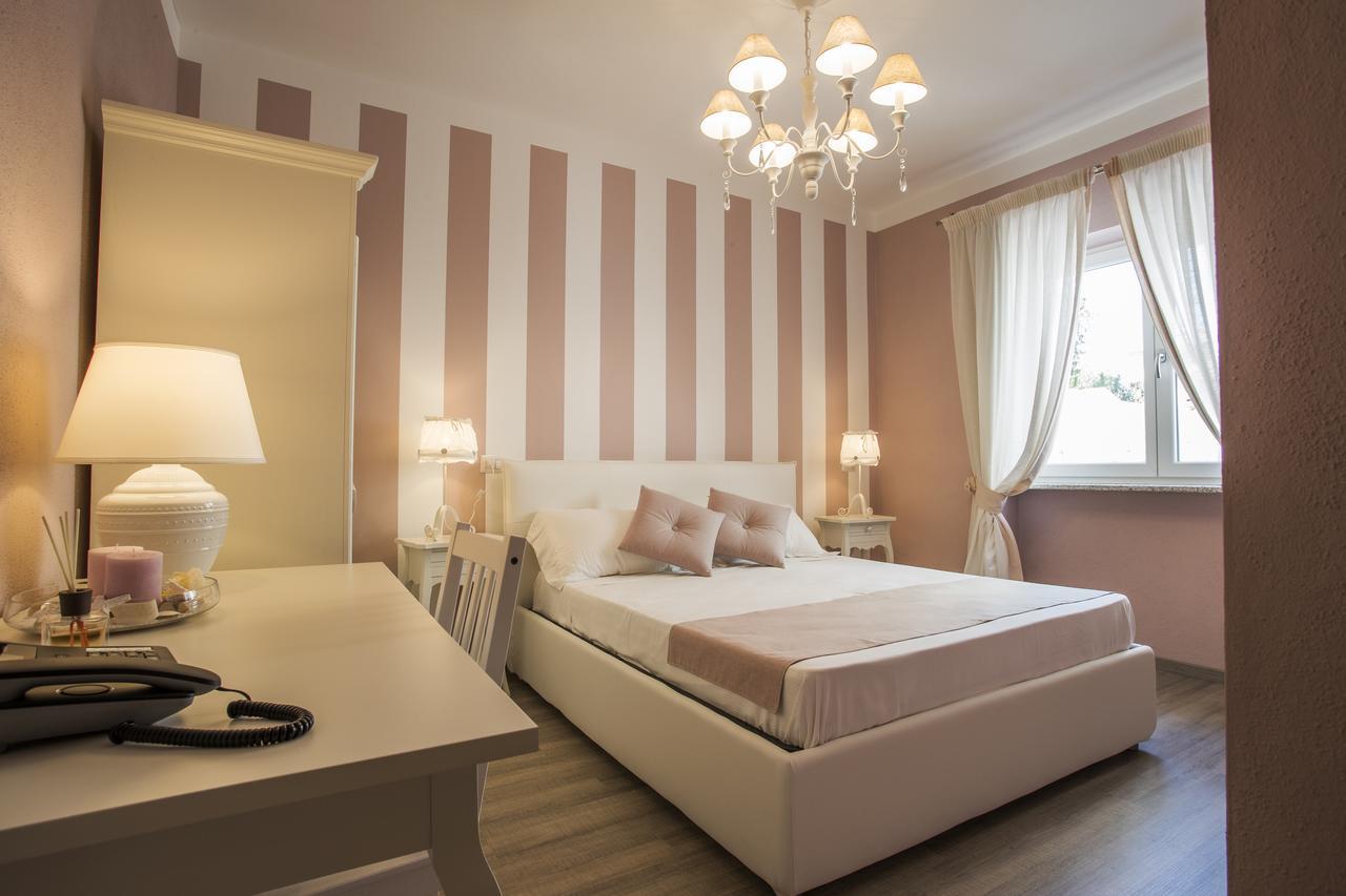Les Suites Magnolia Olbia Bagian luar foto