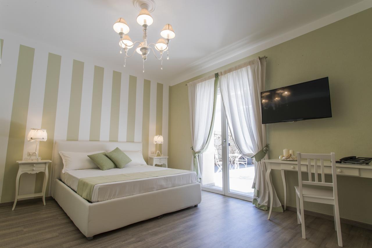 Les Suites Magnolia Olbia Bagian luar foto